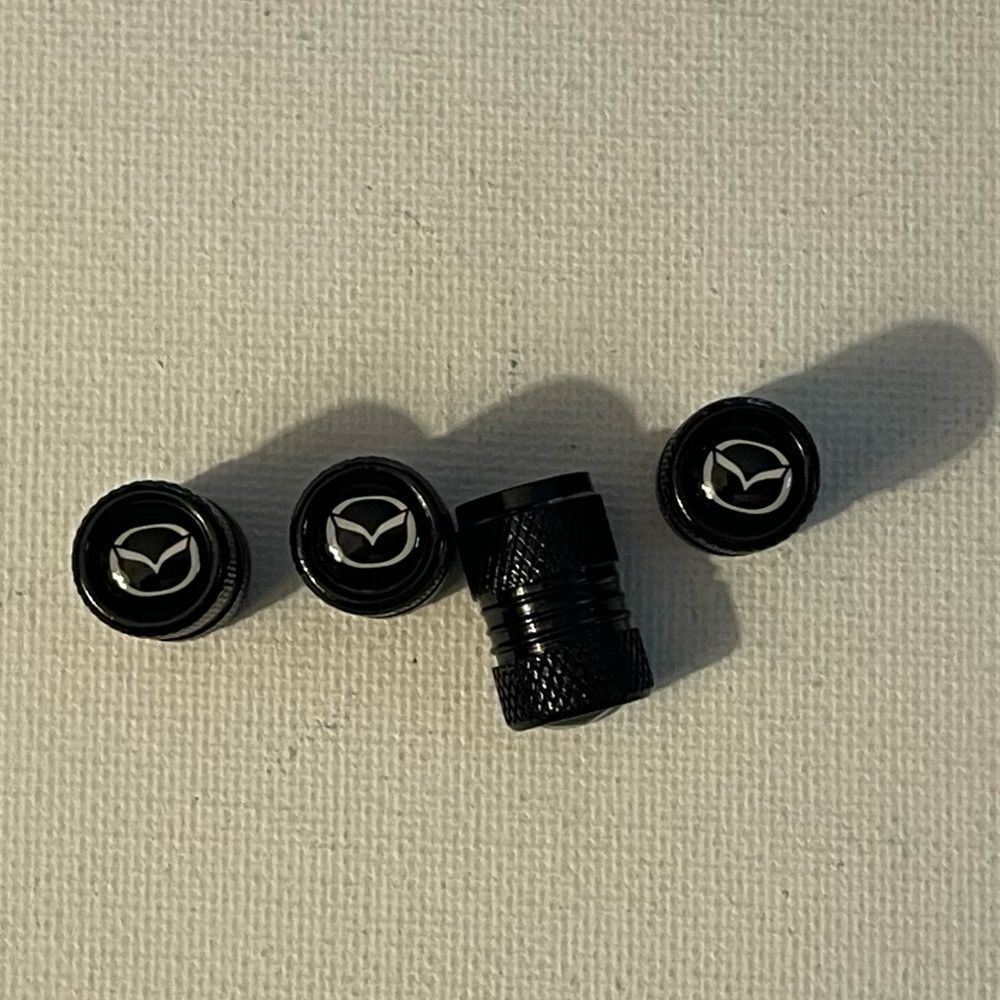 Mazda valve Stem caps in Black set of 4 NWT